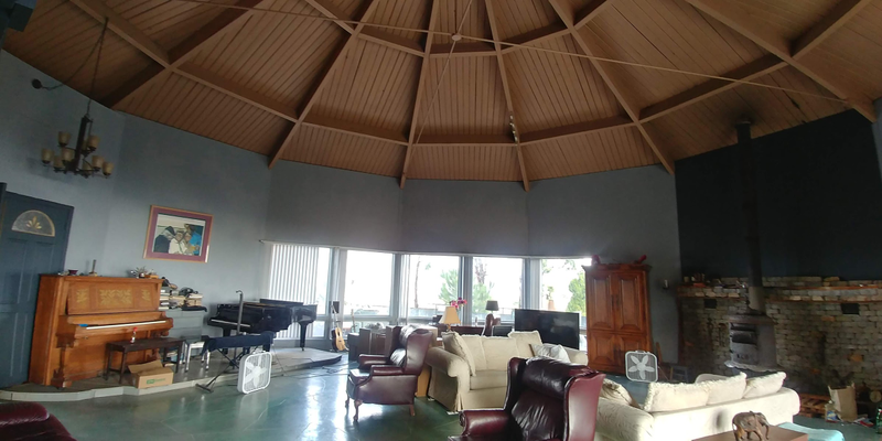 The living room has a very tall dome ceiling with an open kitchen attached. Being reorganized at the moment but I love the space.